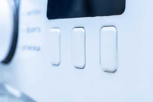 A close-up of an energy-efficient washing machine's control panel, highlighting the cold water wash option and energy-saving cycles. The display shows an estimated energy consumption for different settings.