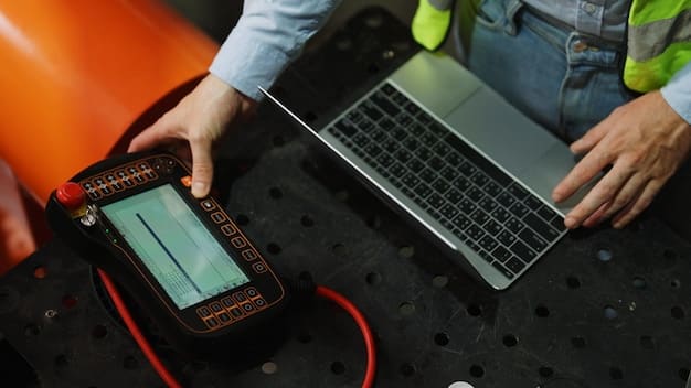 A technician using a thermal camera to scan a battery rack, identifying potential hotspots that could indicate failing cells or connections.